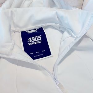 ASOS-White Ski
Faux-fur trim
Belted waist
Thumbhole cuffs
Flared leg
Slim fit